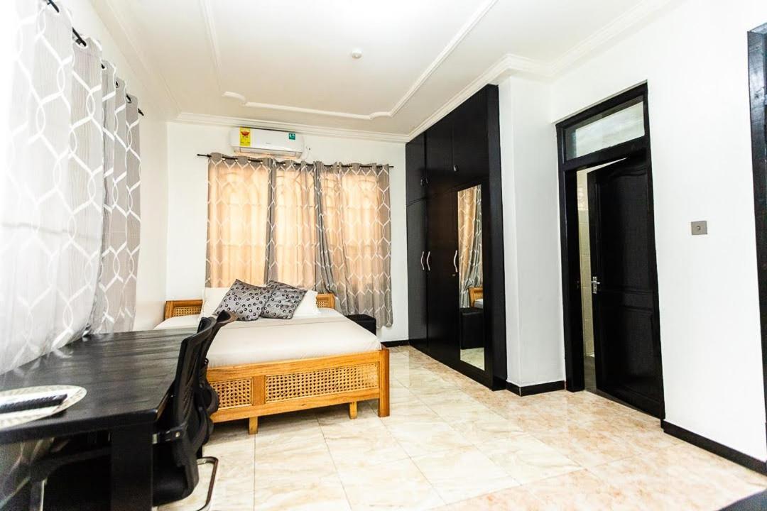 Dann Residence Ogbodjo ภายนอก รูปภาพ