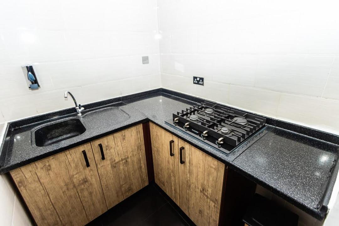 Dann Residence Ogbodjo ภายนอก รูปภาพ